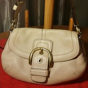 Authentic Coach leather shoulder purse.