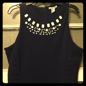 Stunning navy blue dress with detailed neckline