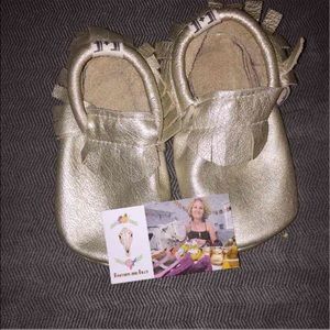 Feather and filly handmade moccasins