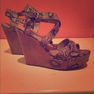 Snake print wedges.