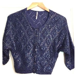 Sequined blue sweater from Anthropologie.