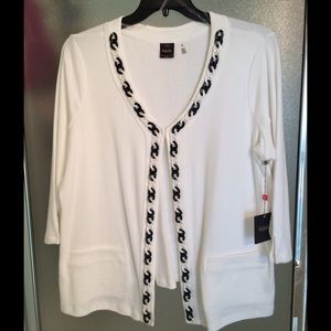 White sweater with black trim