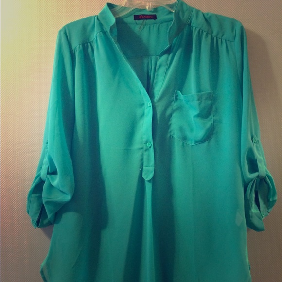 Large turquoise blouse