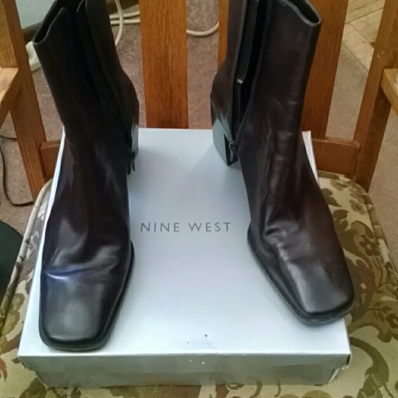 Dark brown leather short boots.