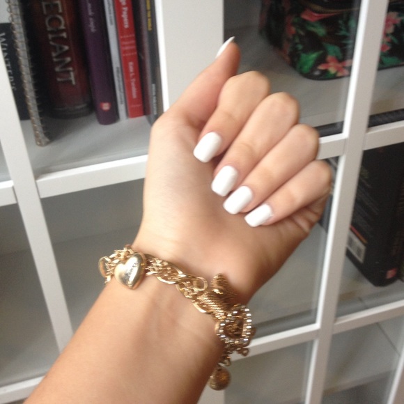 Gold Guess charm bracelet