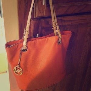 Michael Kors Orange handbag, gently used