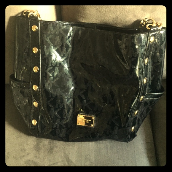 Black and gold leather Michael kors bag