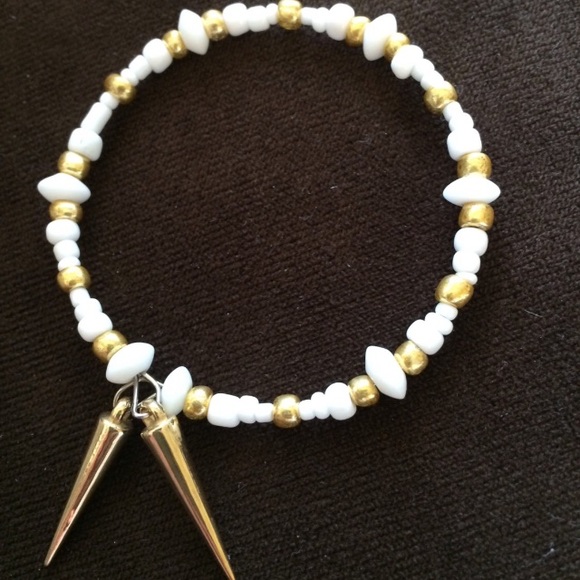 Gold and white bracelet