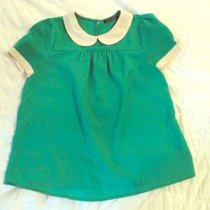 Peter Pan Collared silk top.