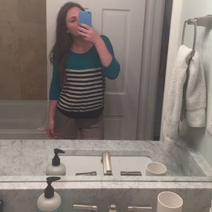 blue sweater with black and white strips!