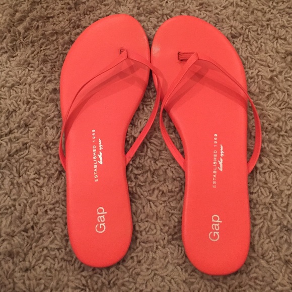 neon orange flip flops
