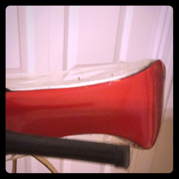 Red bottom heels.