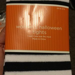 Woman's black and white Halloween tights