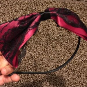 Black and hot pink headband with Bo new never worn