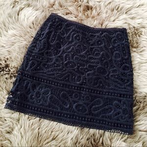 Navy lace mini skirt