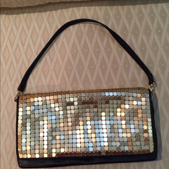 Fun gold and black leather evening bag.