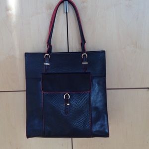 Black leather henri bendel satchel with red trim