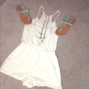 Adorable cream romper!
