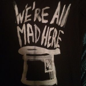 An Alice in wonderland t-shirt. Trading.