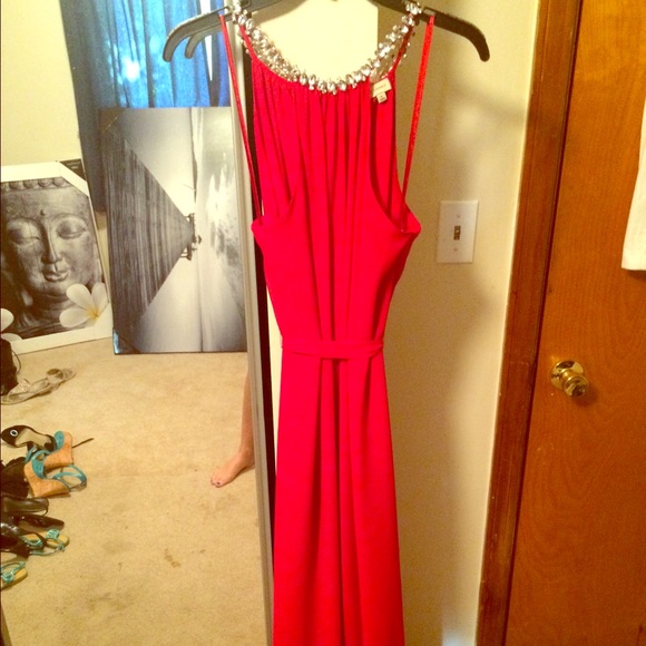Full length red formal gown.