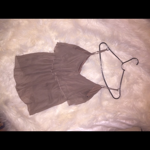 A beautiful blouse perfect for high wasted pants.