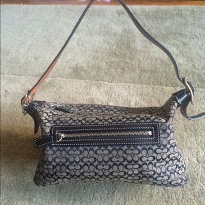 Coach black mini purse in excellent used condition