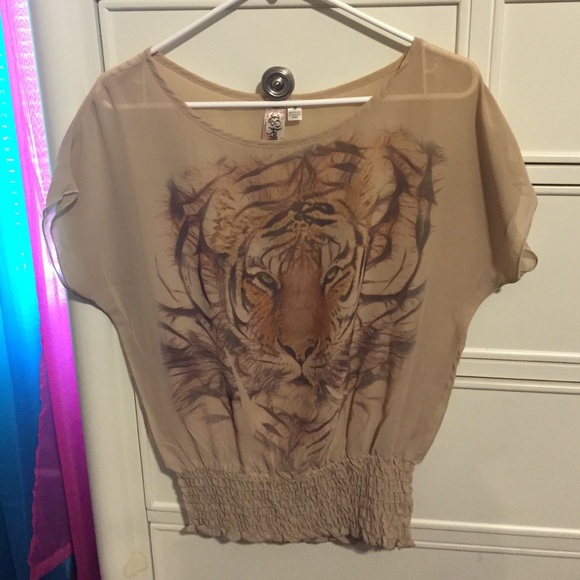 Brown blouse with a tiger on it