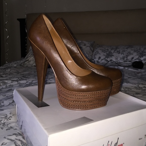 Brown leather heals.