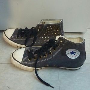 Gold studded high top converse