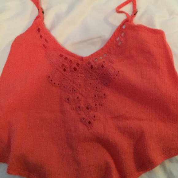 pink/orang tank top with very small cutouts