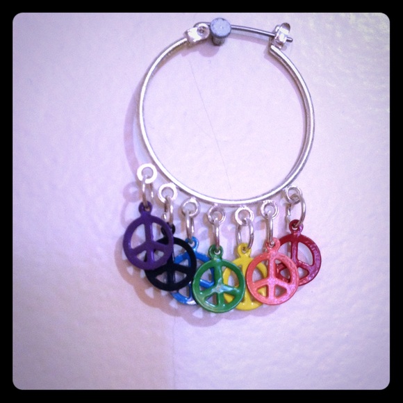 Rainbow peace sign earrings.