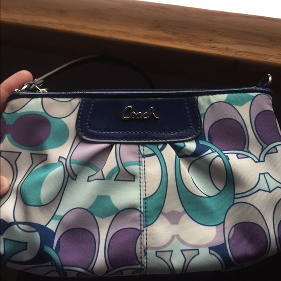 Authentic coach clutch