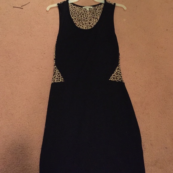 Black mini dress with sheer cheetah print detail