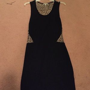 Black mini dress with sheer cheetah print detail