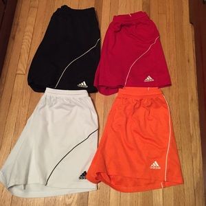 Women's adidas shorts. Red,black, and orange