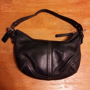 Authentic Black Leather goes with all Coach Purse