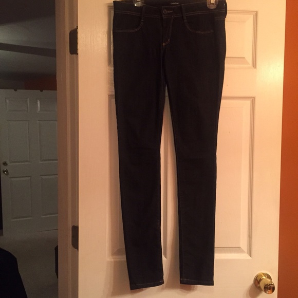 Bebe...Dark blue with tan stitching jeans