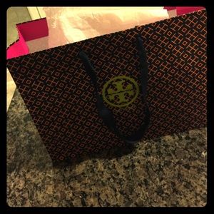 Tory burch shopping bag.