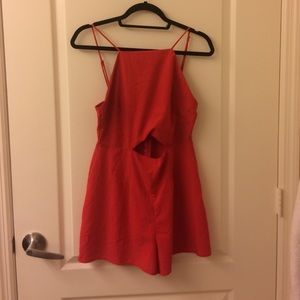 Red romper with cutouts