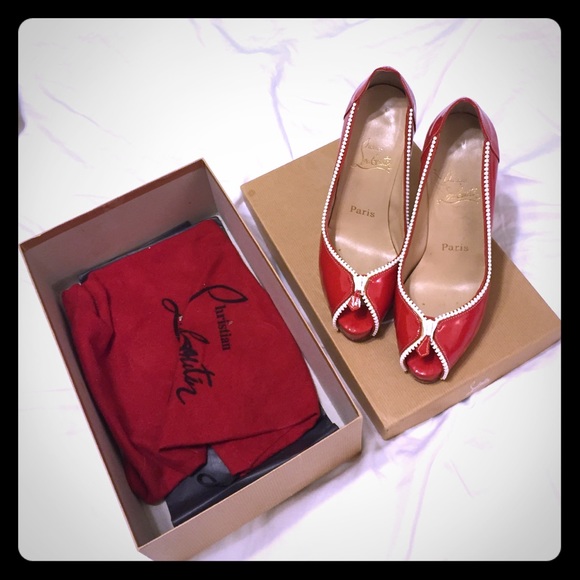 Christian Louboutin peep toe pumps