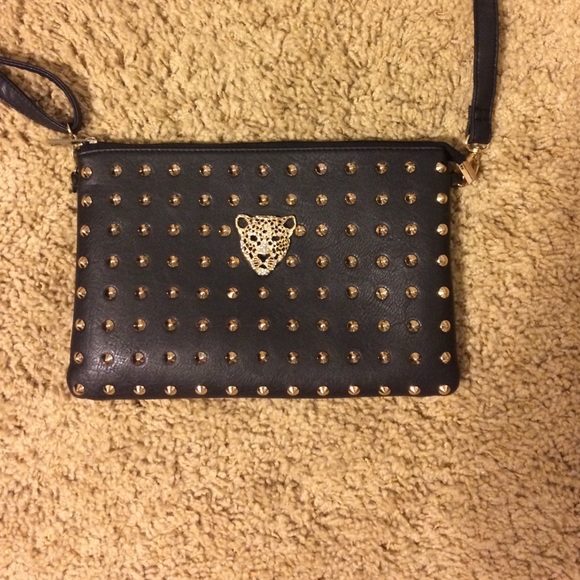 Black and gold studded clutch.