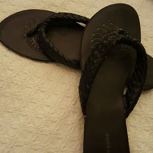 Black leather flip flops