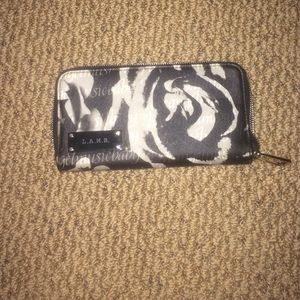 genuine L.A.M.B wallet by Gwen stefani.