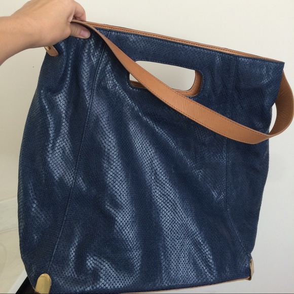 Vince Camuto leather (snake like) blue and tan,