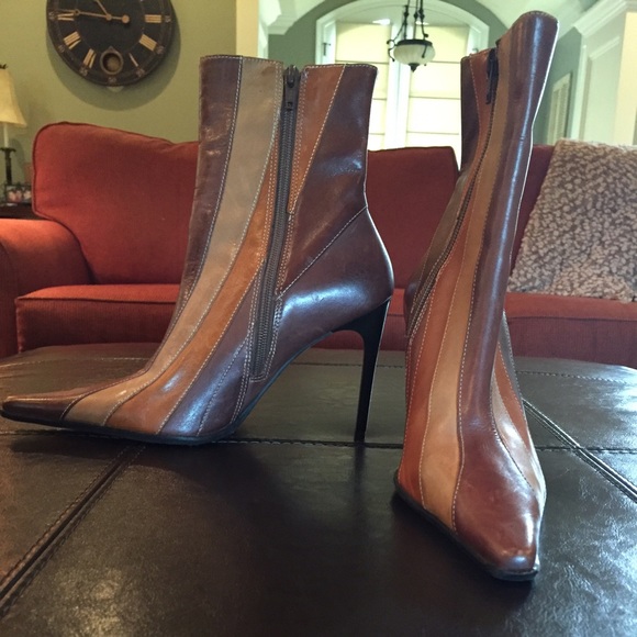 Beautiful Boot in shades of brown, tan, and saddle