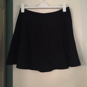 Black circle skirt with velvet dots