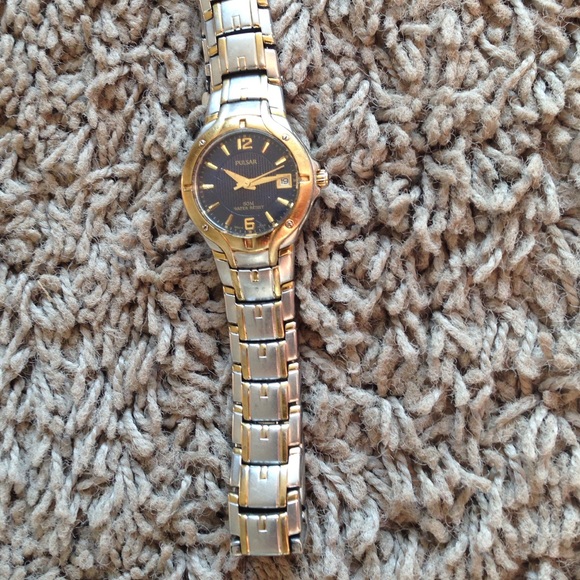 Two tone silver and gold pulsar watch