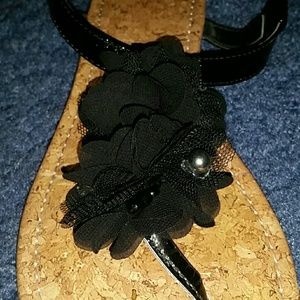 tan and black sandals