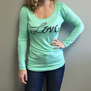 Adorable mint top with bow on the back!