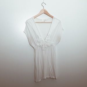 Beautiful cream blouse with flower details